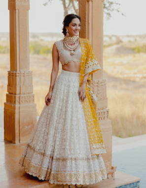 white choli - faux georgette | inner - silk | size - unstitch upto 42 | lehenga - faux georgette | inner - silk | stitching  type - semistitch upto 44 | flair - 3.5m with canvas and cancan | dupatta - soft net embroidery sequance work ( 2.2 m)  fabric embroidery work party wear 