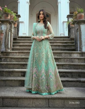 green top - heavy vaishnavi net with sequance coding work | sleeves - vaishnavi net with coding work  stone work | inner - dull satin | bottom - dull santoon | dupatta - net | length - max upto 56+ | size - max upto 44 | flair - 3.80 m fabric embroidery work party wear 