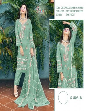 parrot green top - heavy organza with heavy embroidery | bottom - dull santoon  ( inner ) | dupatta - net with embroidery  fabric embroidery work casual 