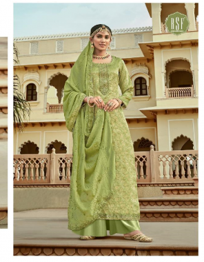 parrot green top - pure silk jacquard top with heavy embroidery with handwork with santun inner | bottom - dull santun | dupatta - pure gadhwal silk with heavy embroidery work with four side lace fabric jacquard + embroidery work casual 