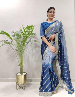 sky blue fabric -two tone heavy georgette fabric all over saree foil print and attached weaving border with weaving zari blouse (master copy) fabric weaving work festive 