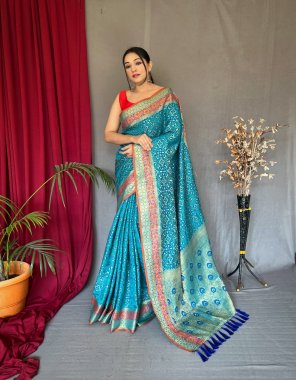 sky pure patola silk saree with flower and patola fusion all over contrast patola weaved with contrast meenakari and rich pallu with tassels attached  fabric weaving  work wedding 