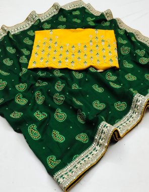 dark green dola silk saree with heavy lace border  fabric printed work festive 