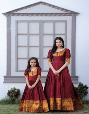 maroon gown fabric & work - silk with jacquard weaving work | lining - cotton (full inner top to bottom) | sleeves type - regular elbow sleeve | neck - fancy round neck | adult gown length - up to 56