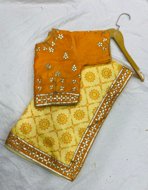 yellow saree -dolla silk |blouse -full stitch 38ready upto 42  fabric gotta patti work running 