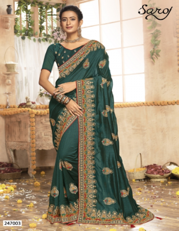 green vichitra dyrd fabric and work with jari kasab borders and diamond work with heavy blouse  fabric embroidery diamond work work festive  