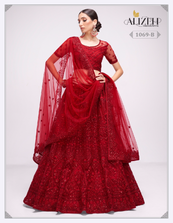 red blouse - net with silk inner | lehenga - net with silk inner | dupatta - net  fabric cording , thread , sequence , embroidery with stone embellishments work wedding 
